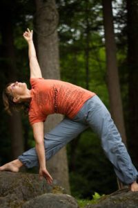 Trikonasana in the forest.