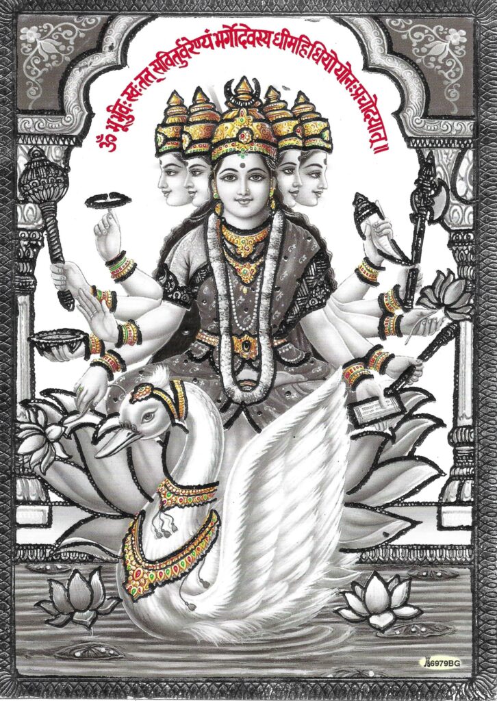 Goddes Gayatri with Swan cr (1) (1) Goddess Gayatri has the mantra in a halo around her head.